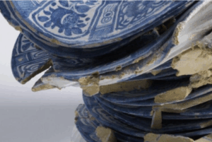 Broken blue and white ceramic plates